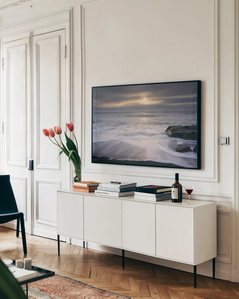 Tides and Waves Sunset I by Alan Majchrowicz. shown as a framed stretched canvas in a living room above a console. Available as a archival giclee rolled canvas, fine art paper, or poster print. SKU 7751i.