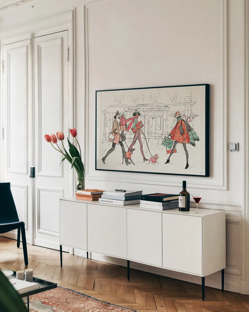 Holiday Fashionistas I by Anne Tavoletti. shown as a framed stretched canvas in a living room above a console. Available as a archival giclee rolled canvas, fine art paper, or poster print. SKU 83920i.