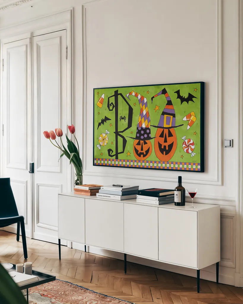 Spooky Fun IV by Anne Tavoletti. shown as a framed stretched canvas in a living room above a console. Available as a archival giclee rolled canvas, fine art paper, or poster print. SKU 48872i.