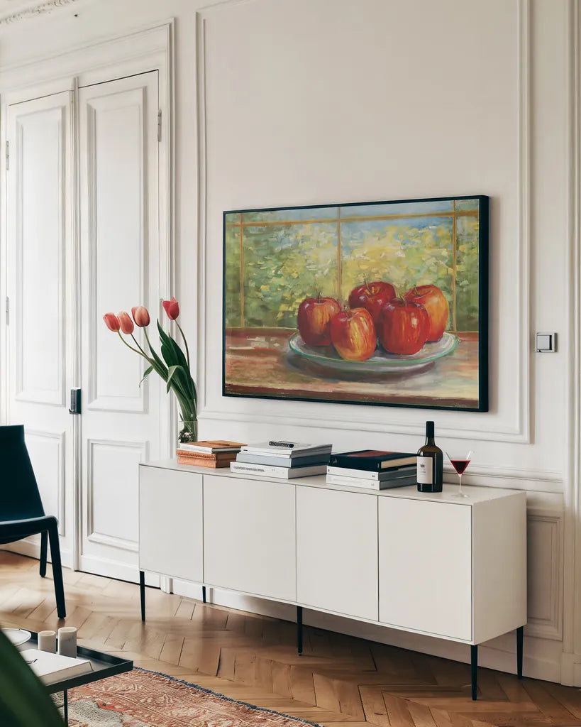 Apples on Windowsill by Carol Rowan. shown as a framed stretched canvas in a living room above a console. Available as a archival giclee rolled canvas, fine art paper, or poster print. SKU 99970i.