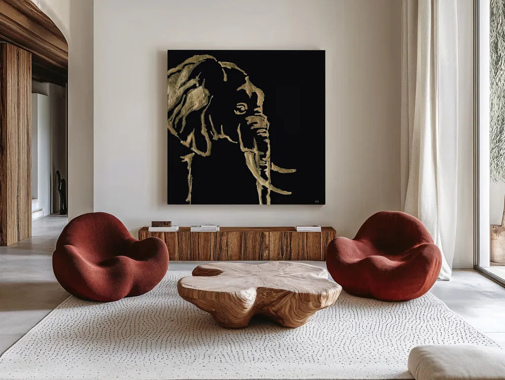 Gilded Elephant on Black by Chris Paschke. Shown as extra-large giant wall art in a modern living room. Available as an archival giclee rolled canvas, fine art paper, or poster print. SKU 31574a.