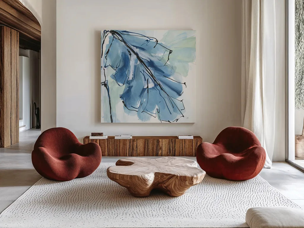 Luxe Banana Leaf IV by Chris Paschke. Shown as extra-large giant wall art in a modern living room. Available as an archival giclee rolled canvas, fine art paper, or poster print. SKU 84579a.