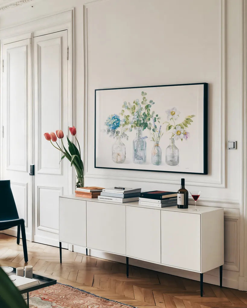 Beach Flowers I no coral by Danhui Nai. shown as a framed stretched canvas in a living room above a console. Available as a archival giclee rolled canvas, fine art paper, or poster print. SKU 80141i.