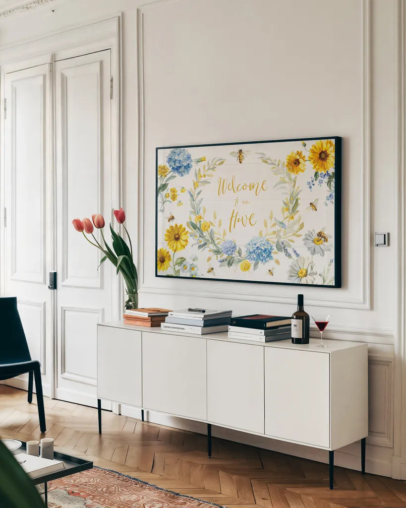 Bees and Blooms Flowers I by Danhui Nai. shown as a framed stretched canvas in a living room above a console. Available as a archival giclee rolled canvas, fine art paper, or poster print. SKU 78394i.