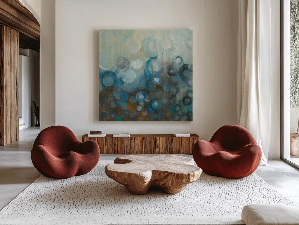 Blue and Bronze Dots VII by Danhui Nai. Shown as extra-large giant wall art in a modern living room. Available as an archival giclee rolled canvas, fine art paper, or poster print. SKU 29769a.