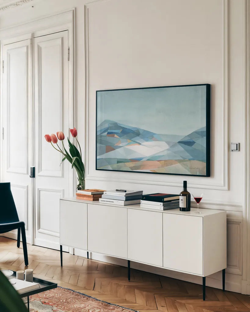 Geometric Mountain by Danhui Nai. shown as a framed stretched canvas in a living room above a console. Available as a archival giclee rolled canvas, fine art paper, or poster print. SKU 64051i.