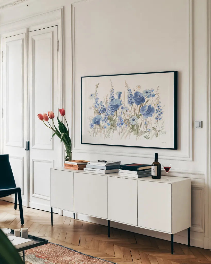 Wildflowers in Bloom I Blue by Danhui Nai. shown as a framed stretched canvas in a living room above a console. Available as a archival giclee rolled canvas, fine art paper, or poster print. SKU 74499i.