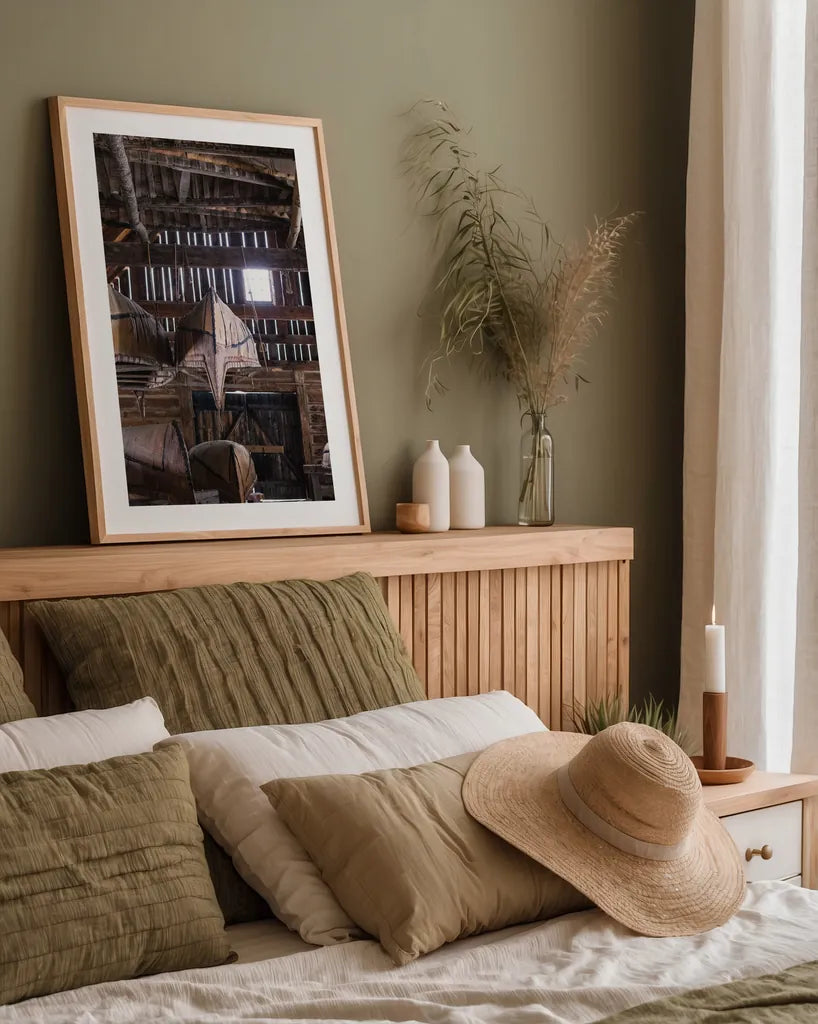 Canoe Barn III by Deborah Revell. shown as a paper print in a natural frame. Available as a archival giclee rolled canvas, fine art paper, or poster print. SKU 99671h.