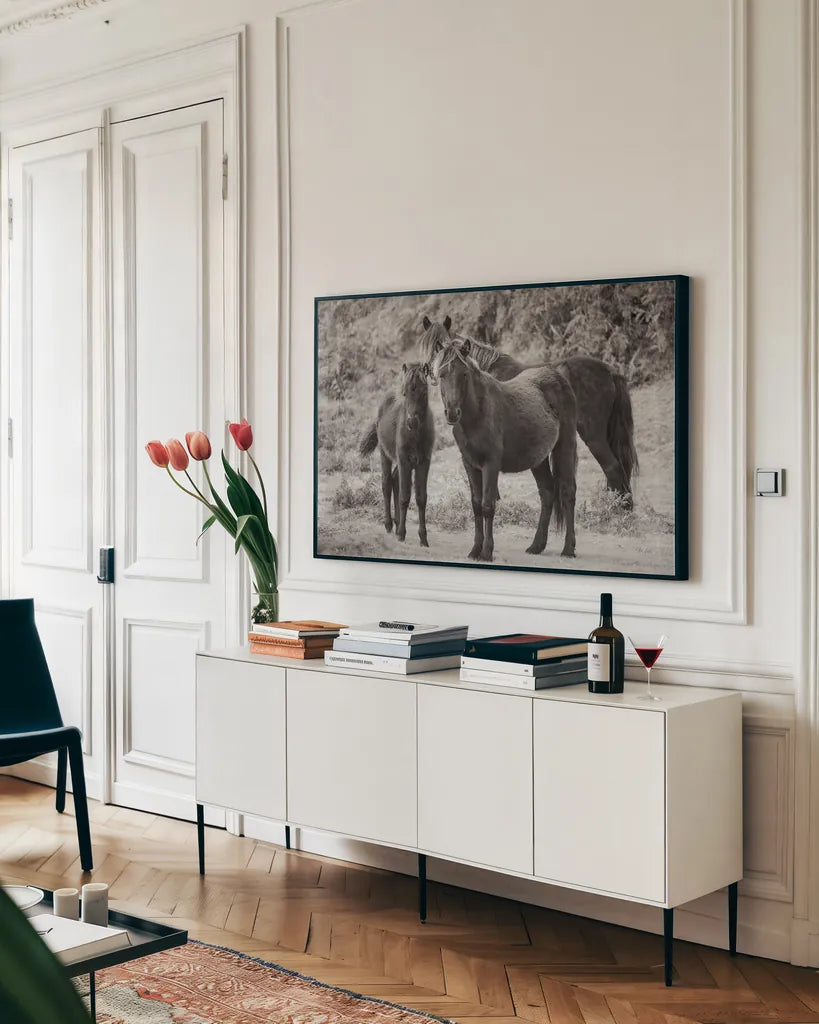 Dartmoor Ponies III by Deborah Revell. shown as a framed stretched canvas in a living room above a console. Available as a archival giclee rolled canvas, fine art paper, or poster print. SKU 94279i.