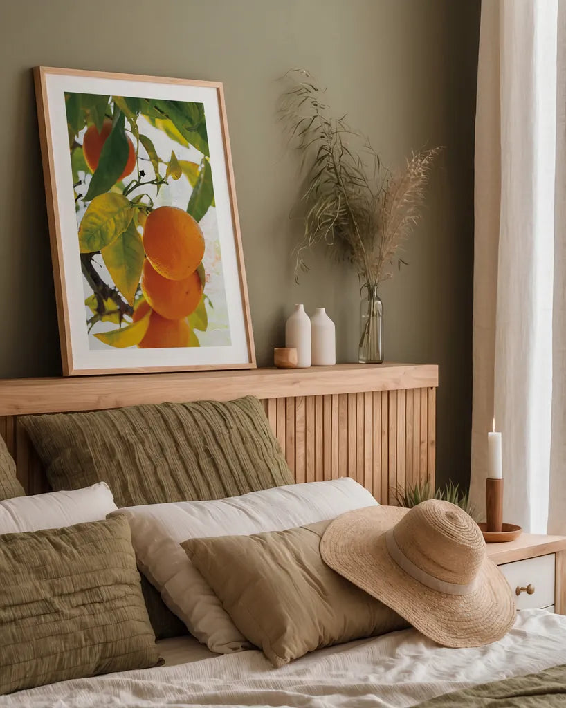 Oranges I by Deborah Revell. shown as a paper print in a natural frame. Available as a archival giclee rolled canvas, fine art paper, or poster print. SKU 94128h.