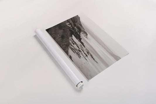 Rock Beach by Deborah Revell. shown as a rolled paper print. Available as archival giclee rolled canvas, fine art paper, or poster print. SKU 101000i.