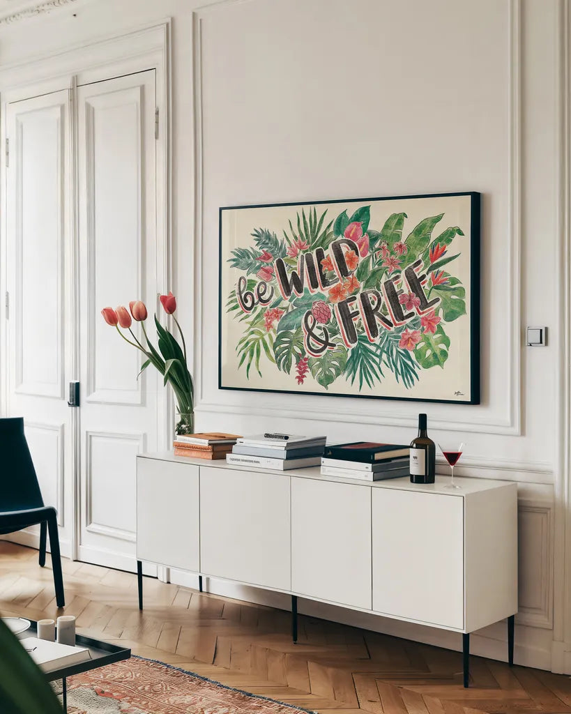 Jungle Vibes VI by Janelle Penner. shown as a framed stretched canvas in a living room above a console. Available as a archival giclee rolled canvas, fine art paper, or poster print. SKU 45865i.