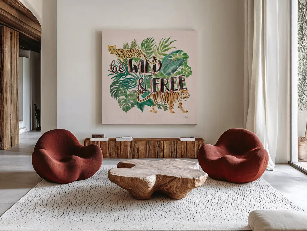 Jungle Vibes VII - Be Wild and Free Pink by Janelle Penner. Shown as extra-large giant wall art in a modern living room. Available as an archival giclee rolled canvas, fine art paper, or poster print. SKU 47198a.