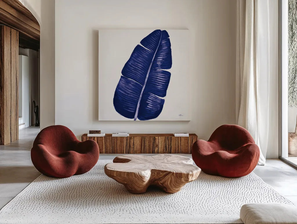Welcome to Paradise XV Indigo by Janelle Penner. Shown as extra-large giant wall art in a modern living room. Available as an archival giclee rolled canvas, fine art paper, or poster print. SKU 34081a.