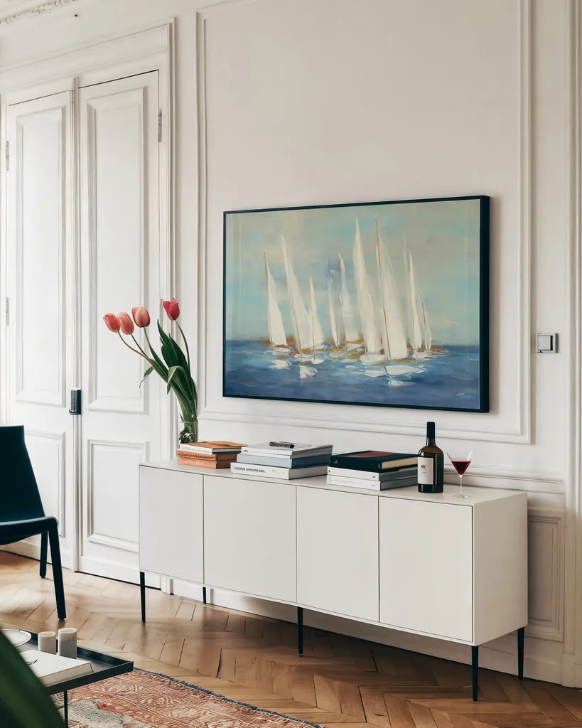Regatta Sail by Julia Purinton. shown as a framed stretched canvas in a living room above a console. Available as a archival giclee rolled canvas, fine art paper, or poster print. SKU 73872i.