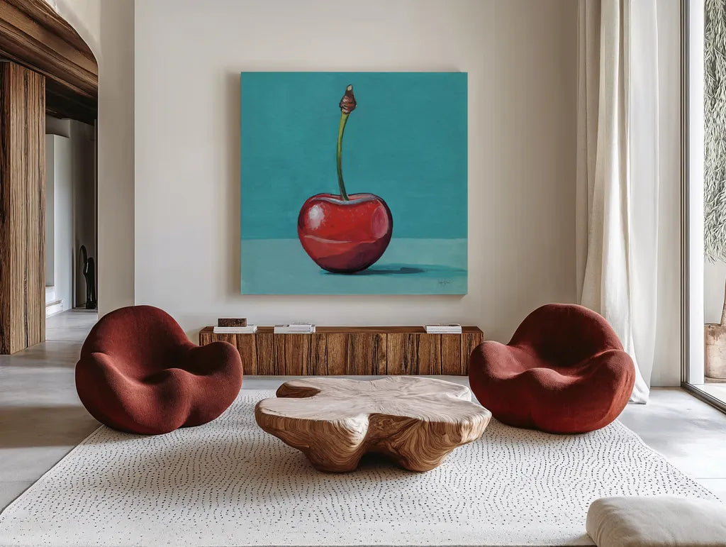 A Single Shiny Cherry by Kate Jarvik Birch. Shown as extra-large giant wall art in a modern living room. Available as an archival giclee rolled canvas, fine art paper, or poster print. SKU 101978a.