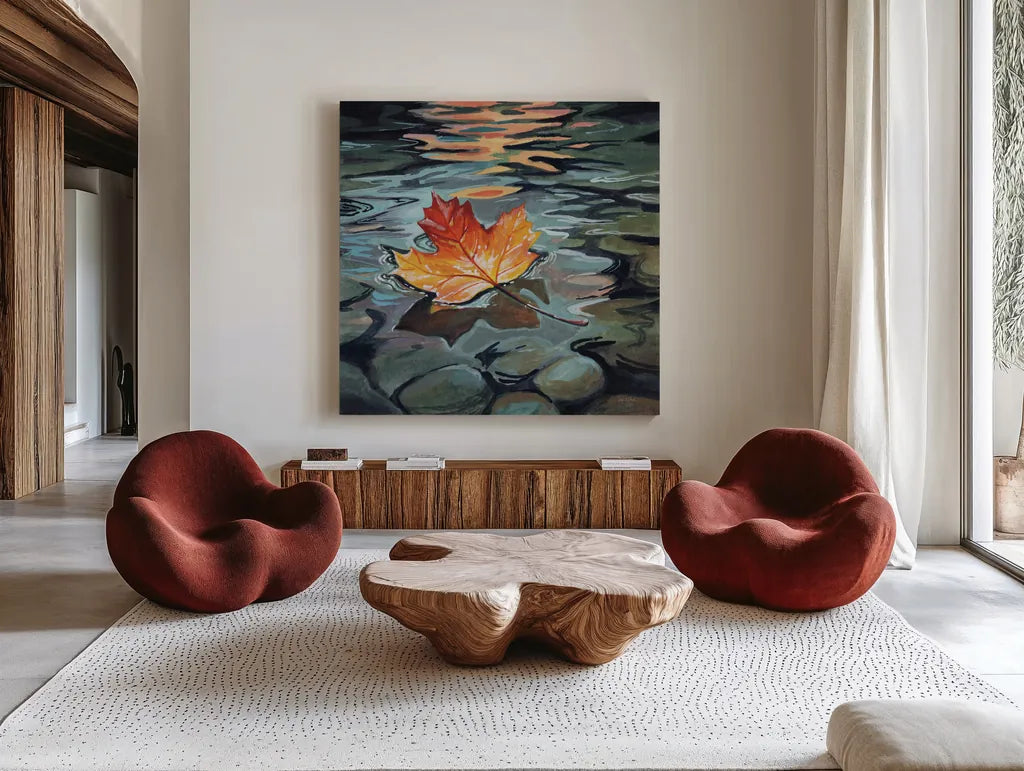 Maple Leaf Floating In a Stream by Kate Jarvik Birch. Shown as extra-large giant wall art in a modern living room. Available as an archival giclee rolled canvas, fine art paper, or poster print. SKU 101976a.