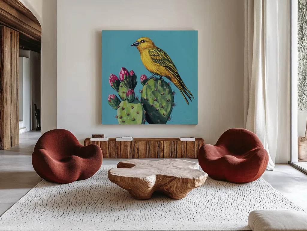 Yellow Bird on Cacti Bloom by Kate Jarvik Birch. Shown as extra-large giant wall art in a modern living room. Available as an archival giclee rolled canvas, fine art paper, or poster print. SKU 98543a.