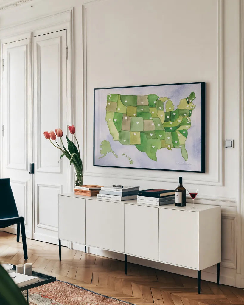 USA Capital Map by Kathleen Parr McKenna. shown as a framed stretched canvas in a living room above a console. Available as a archival giclee rolled canvas, fine art paper, or poster print. SKU 53450i.