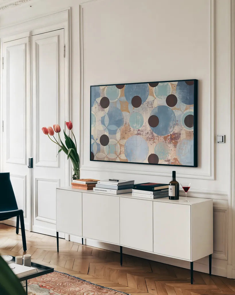 Blue Dots by Kathrine Lovell. shown as a framed stretched canvas in a living room above a console. Available as a archival giclee rolled canvas, fine art paper, or poster print. SKU 22747i.