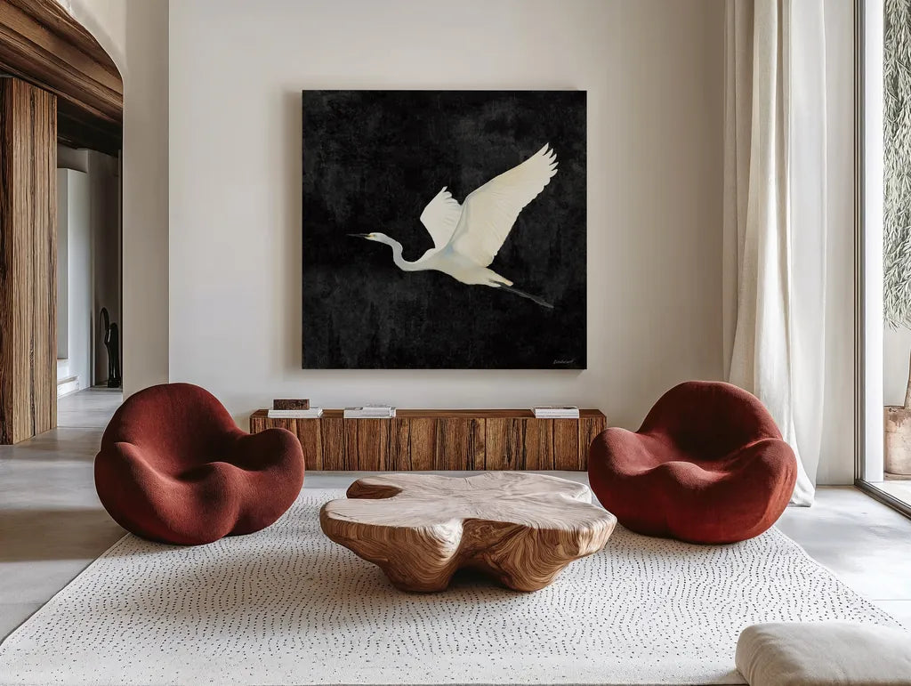 Egret Alighting II Flipped Black by Kathrine Lovell. Shown as extra-large giant wall art in a modern living room. Available as an archival giclee rolled canvas, fine art paper, or poster print. SKU 79055a.