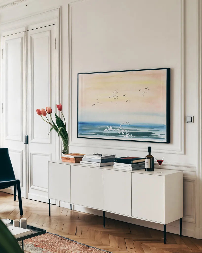 Sunset Shore by Kristy Rice. shown as a framed stretched canvas in a living room above a console. Available as a archival giclee rolled canvas, fine art paper, or poster print. SKU 88609i.