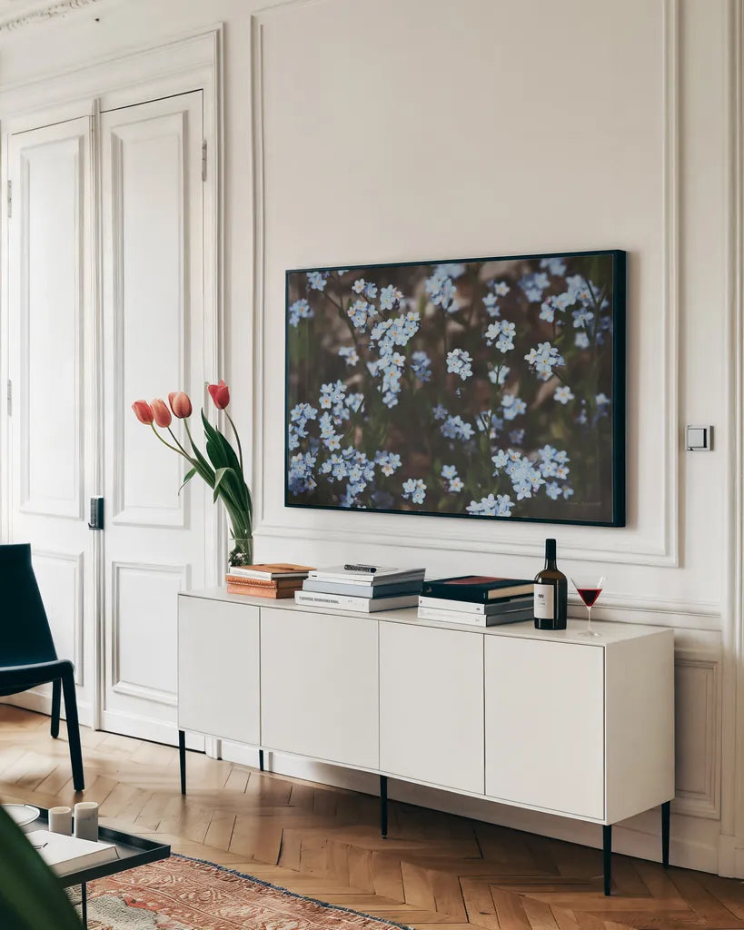 Forget Me Nots II by Laura Marshall. shown as a framed stretched canvas in a living room above a console. Available as a archival giclee rolled canvas, fine art paper, or poster print. SKU 63260i.