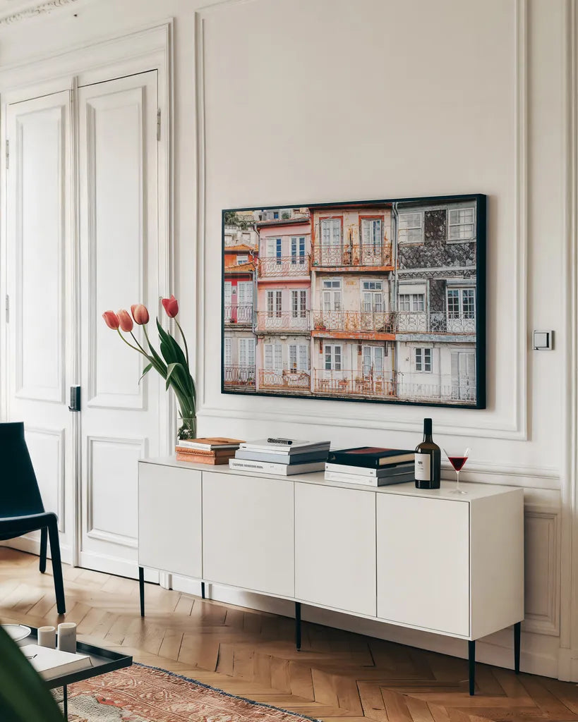 Porto Houses by Laura Marshall. shown as a framed stretched canvas in a living room above a console. Available as a archival giclee rolled canvas, fine art paper, or poster print. SKU 81307i.