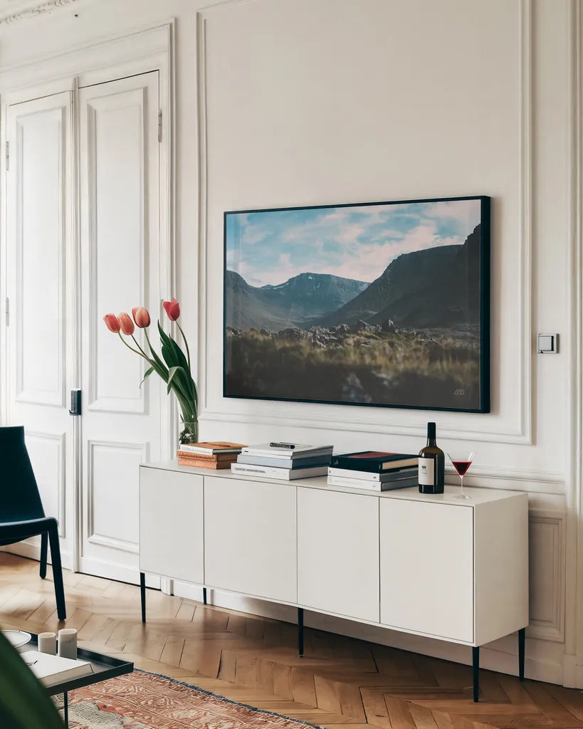 Iceland Hike by Max Blakesberg Studios. shown as a framed stretched canvas in a living room above a console. Available as a archival giclee rolled canvas, fine art paper, or poster print. SKU 90837i.