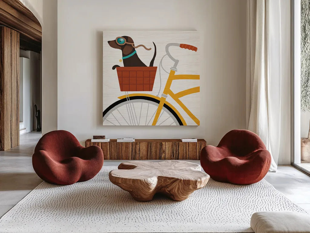 Beach Bums Dachshund Bicycle I by Michael Mullan. Shown as extra-large giant wall art in a modern living room. Available as an archival giclee rolled canvas, fine art paper, or poster print. SKU 23291a.