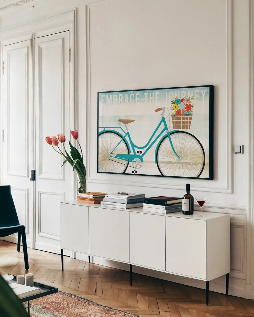 Beach Cruiser Hers I by Michael Mullan. shown as a framed stretched canvas in a living room above a console. Available as a archival giclee rolled canvas, fine art paper, or poster print. SKU 23263i.