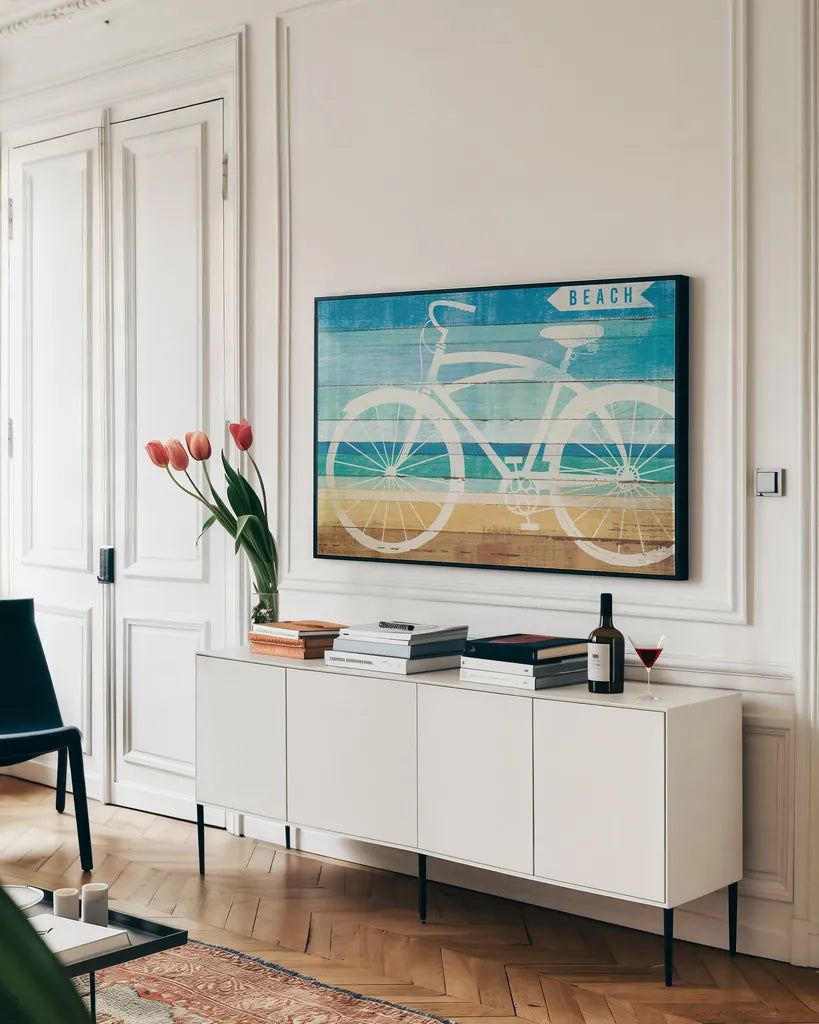 Beachscape Cruiser II by Michael Mullan. shown as a framed stretched canvas in a living room above a console. Available as a archival giclee rolled canvas, fine art paper, or poster print. SKU 23115i.