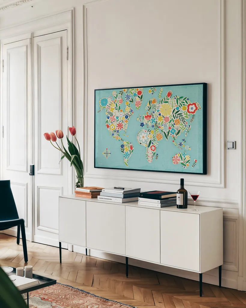 Floral World Blue by Michael Mullan. shown as a framed stretched canvas in a living room above a console. Available as a archival giclee rolled canvas, fine art paper, or poster print. SKU 25719i.