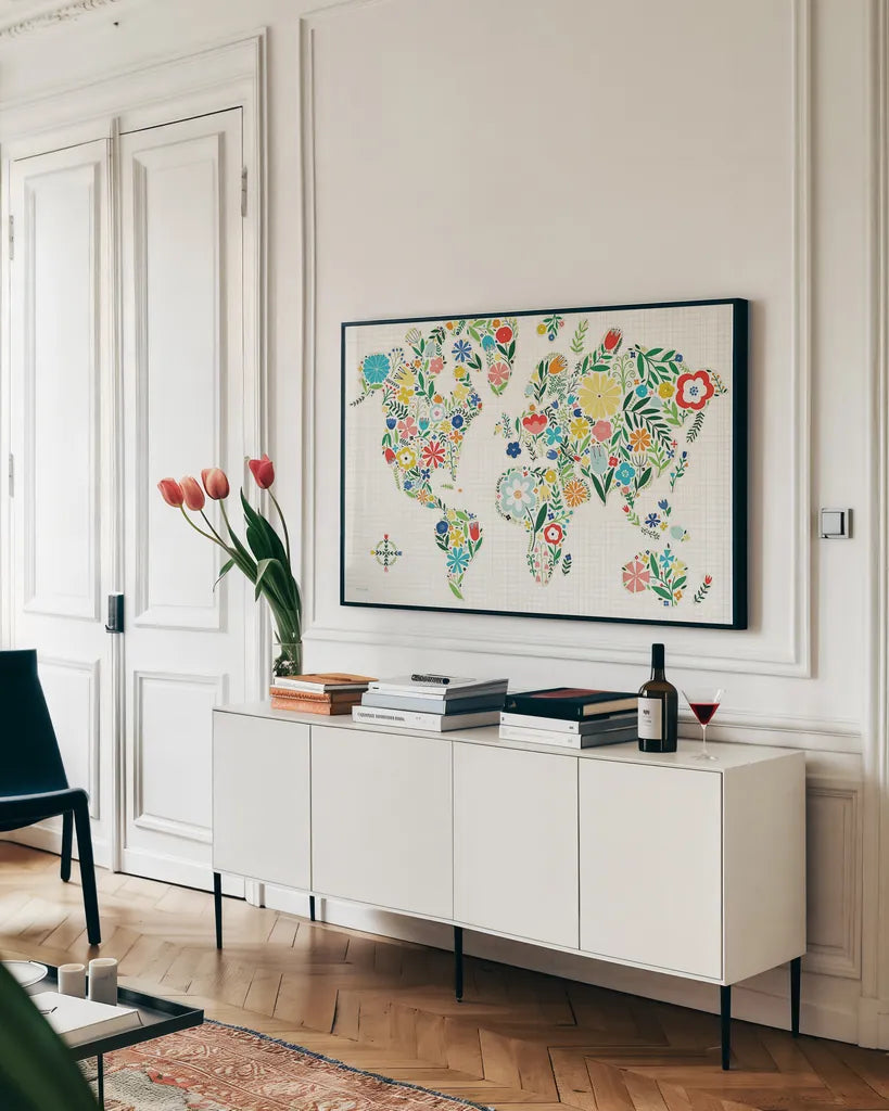 Floral World White by Michael Mullan. shown as a framed stretched canvas in a living room above a console. Available as a archival giclee rolled canvas, fine art paper, or poster print. SKU 25721i.