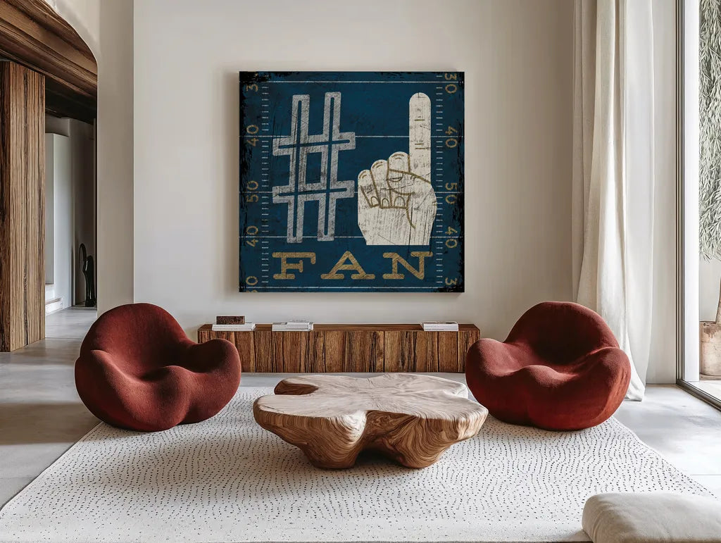 Football IV Blue by Michael Mullan. Shown as extra-large giant wall art in a modern living room. Available as an archival giclee rolled canvas, fine art paper, or poster print. SKU 20349a.