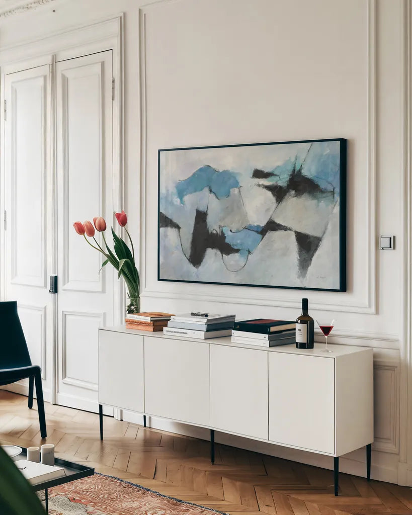 Shadow of Winter by Mike Schick. shown as a framed stretched canvas in a living room above a console. Available as a archival giclee rolled canvas, fine art paper, or poster print. SKU 49844i.