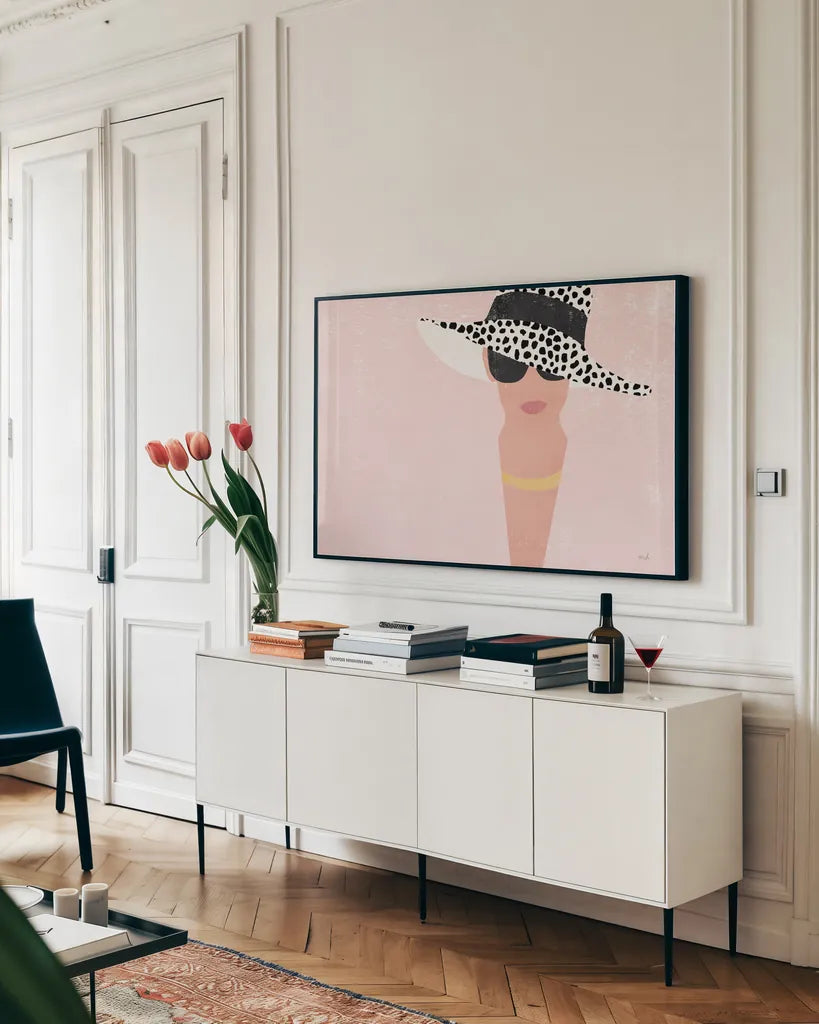 Fashion Forward Blush by Moira Hershey. shown as a framed stretched canvas in a living room above a console. Available as a archival giclee rolled canvas, fine art paper, or poster print. SKU 67597i.