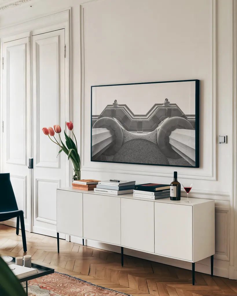 Arch Angles II BW by Nathan Larson. shown as a framed stretched canvas in a living room above a console. Available as a archival giclee rolled canvas, fine art paper, or poster print. SKU 87729i.