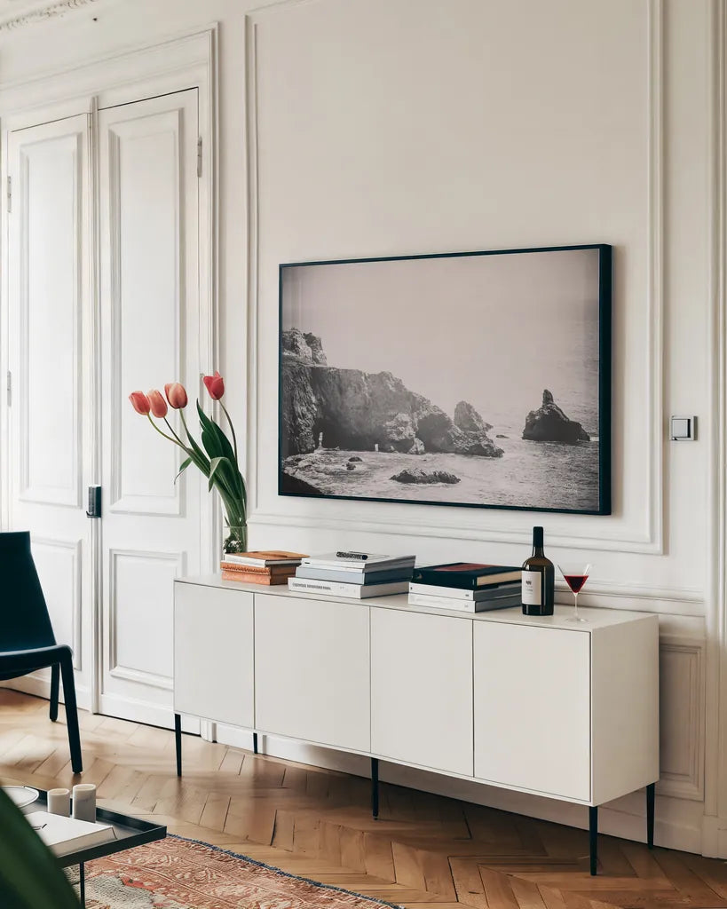 Passing Through Cove by Nathan Larson. shown as a framed stretched canvas in a living room above a console. Available as a archival giclee rolled canvas, fine art paper, or poster print. SKU 88485i.