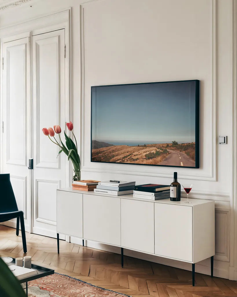 Road to the Lost Coast by Nathan Larson. shown as a framed stretched canvas in a living room above a console. Available as a archival giclee rolled canvas, fine art paper, or poster print. SKU 88487i.