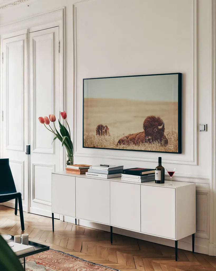 Tall Grass Bison by Nathan Larson. shown as a framed stretched canvas in a living room above a console. Available as a archival giclee rolled canvas, fine art paper, or poster print. SKU 87640i.