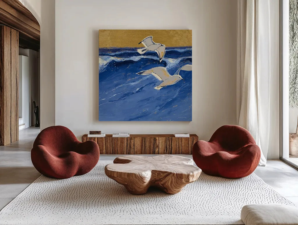 Seagulls with Gold Sky III by Shirley Novak. Shown as extra-large giant wall art in a modern living room. Available as an archival giclee rolled canvas, fine art paper, or poster print. SKU 25258a.