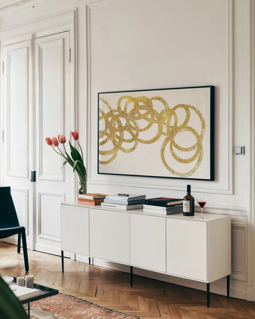 Swirling Element I Crop II Gold by Shirley Novak. shown as a framed stretched canvas in a living room above a console. Available as a archival giclee rolled canvas, fine art paper, or poster print. SKU 68390i.
