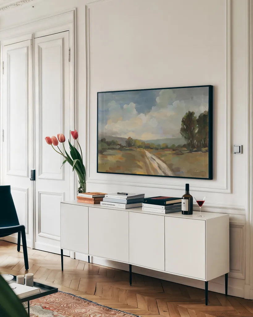 Countryside View by Silvia Vassileva. shown as a framed stretched canvas in a living room above a console. Available as a archival giclee rolled canvas, fine art paper, or poster print. SKU 95134i.