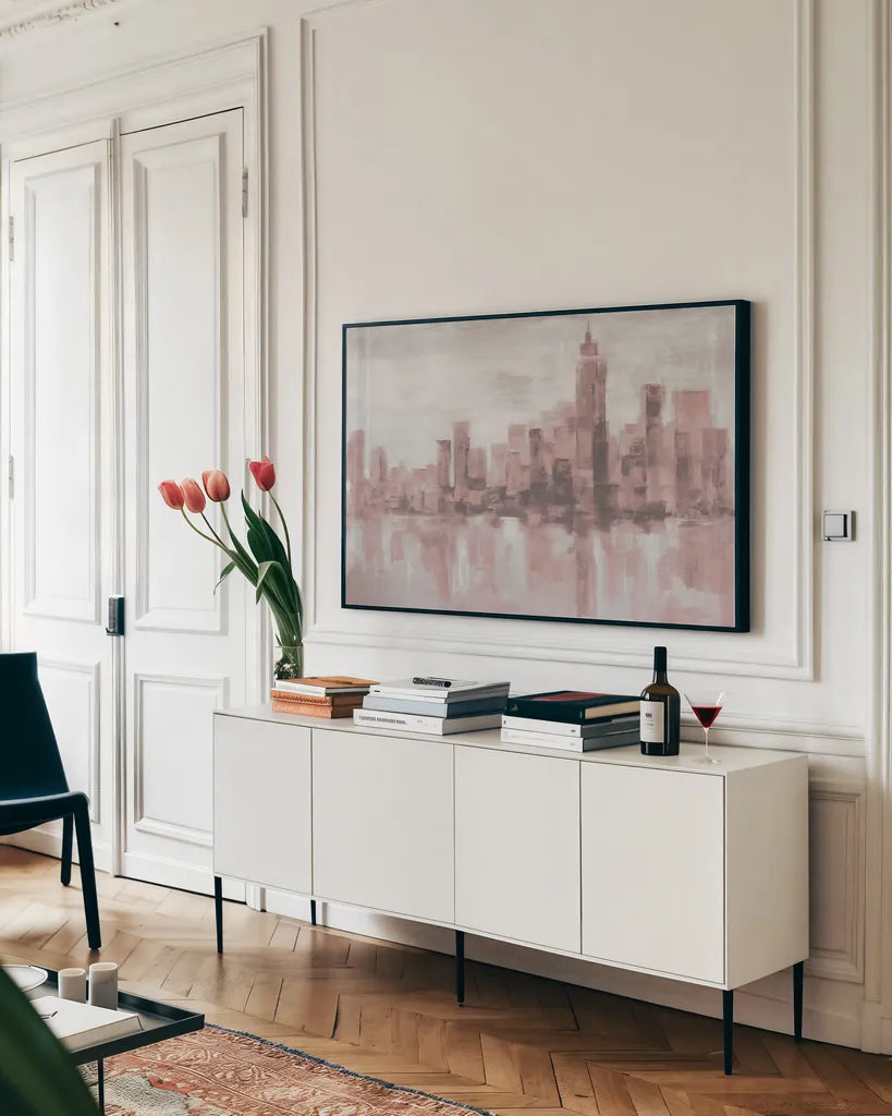 Misty Day in Manhattan Pink Gray by Silvia Vassileva. shown as a framed stretched canvas in a living room above a console. Available as a archival giclee rolled canvas, fine art paper, or poster print. SKU 47865i.