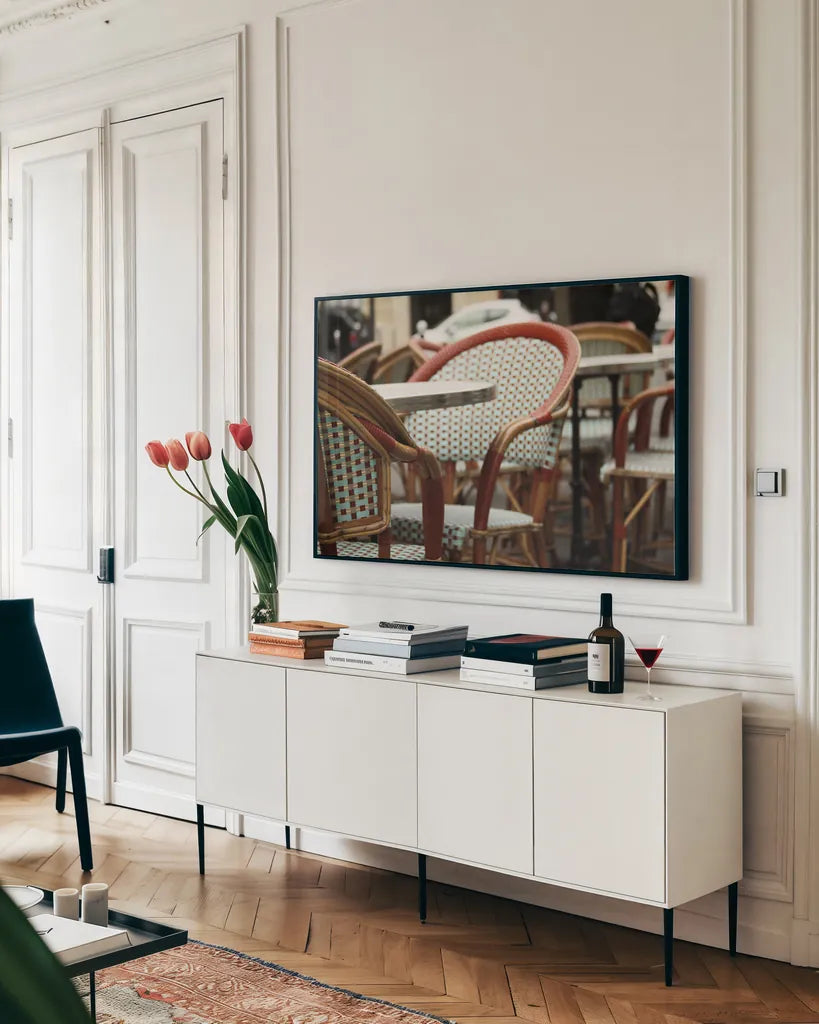Cafe in Paris I by Sue Schlabach. shown as a framed stretched canvas in a living room above a console. Available as a archival giclee rolled canvas, fine art paper, or poster print. SKU 34158i.