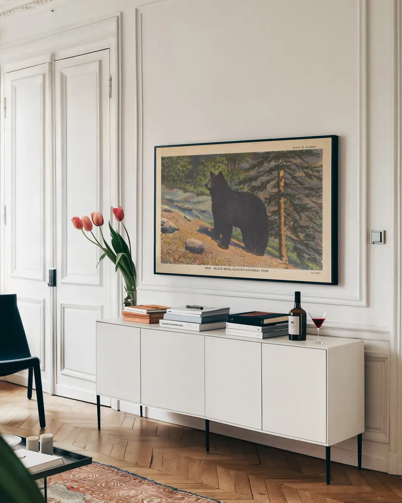 Black Bear I Crop by Wild Apple Portfolio. shown as a framed stretched canvas in a living room above a console. Available as a archival giclee rolled canvas, fine art paper, or poster print. SKU 70114i.