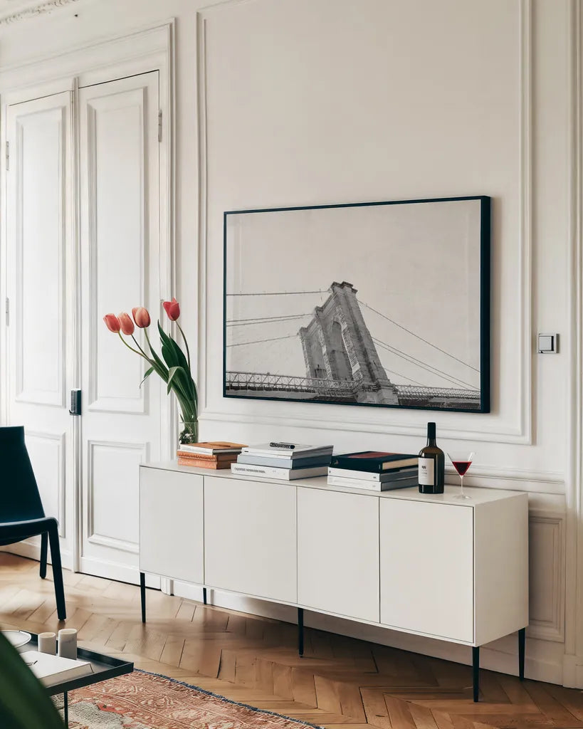 Brooklyn Bridge From Below by Wild Apple Portfolio. shown as a framed stretched canvas in a living room above a console. Available as a archival giclee rolled canvas, fine art paper, or poster print. SKU 67630i.