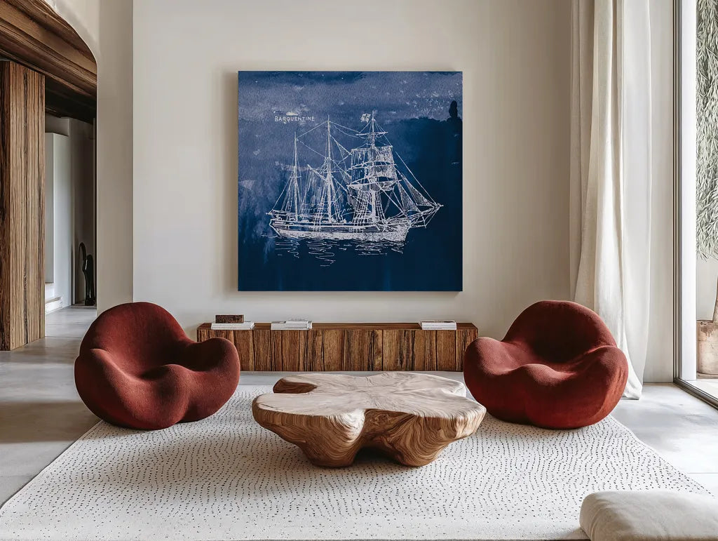 Sailing Ships III Indigo by Wild Apple Portfolio. Shown as extra-large giant wall art in a modern living room. Available as an archival giclee rolled canvas, fine art paper, or poster print. SKU 32100a.