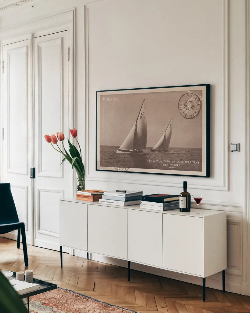 Vintage Sailing I Sepia by Wild Apple Portfolio. shown as a framed stretched canvas in a living room above a console. Available as a archival giclee rolled canvas, fine art paper, or poster print. SKU 47261i.